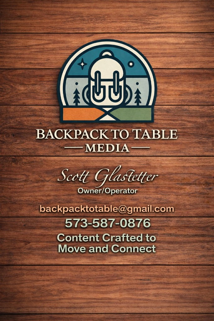 Backpack to Table Media business card with logo and contact details
